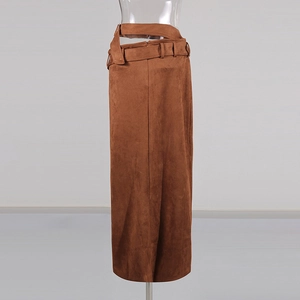 Detail of high waist brown faux suede skirt featuring unique double belts and metal buckles