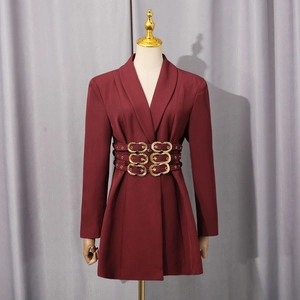 Close-up of wine red blazer dress waist with six golden metal ring buckle decorations