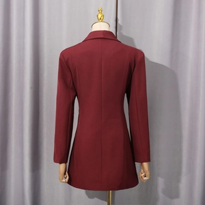 Detailed back view of a slim-fit wine red blazer featuring a structured middle seam