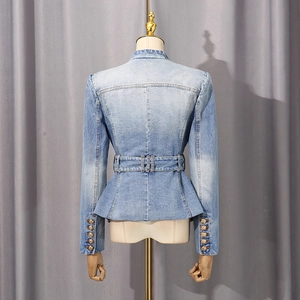 Detailed back view of slim denim jacket featuring peplum hem and gold lion buttons