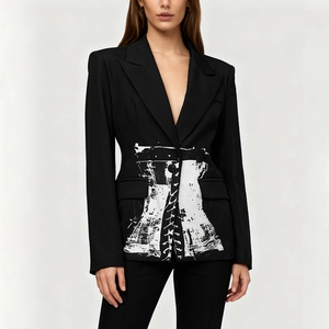 Detailed view of the white vintage corset print on a slim-fit black blazer for women