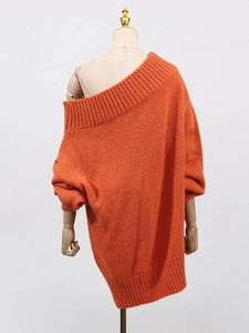 Chic off-shoulder orange knit sweater with ribbed cuffs and relaxed loose fit