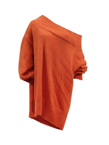 Orange loose knit off-shoulder sweater with slouchy sleeves and ribbed hem details