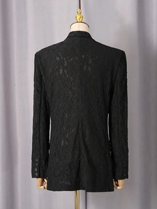 Back view of black floral lace blazer with sheer long sleeves and tailored silhouette