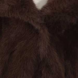 Close-up of deep brown faux fur collar showing long fiber texture and silky luster