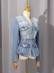 Wash blue denim jacket for women featuring gold lion buttons and an adjustable waist belt