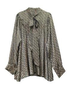 Elegant women's loose blouse with black geometric pattern and chic neck tie bow