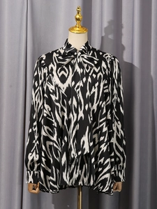 Women's black and white abstract print loose long-sleeve blouse with stylish bow-tie collar