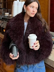 Chic burgundy faux fur jacket for women in short length styled with denim for a luxury look