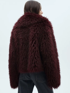 Luxurious burgundy faux fur short coat with textured fluffy fibers and elegant back view