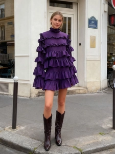 Chic purple layered ruffle mini dress with high neck and matching long leather boots