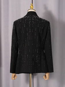 Women's black tailored blazer featuring shimmering vertical rhinestones on the back view