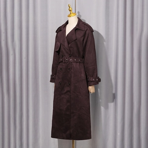 Detail of deep purple faux suede trench coat with double-breasted buttons and belt