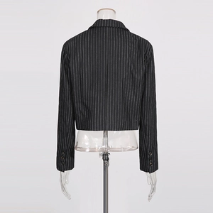 Rear view of cropped pinstripe blazer featuring standard lapel and buttoned cuffs