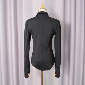 Detail of black slim fit bodysuit featuring thumbhole cuffs and a unique back collar