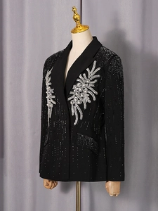 Women's black tailored blazer featuring intricate silver sequin floral embroidery