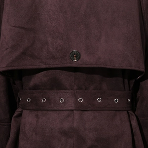 Detail of burgundy suede coat back storm flap with button and metal eyelet belt