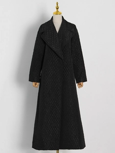 Chic black long quilted coat with notched lapels and elegant diamond stitch pattern