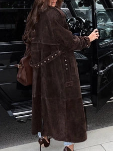 Chic dark brown long suede trench coat with double storm flaps and waist belt for women