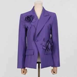 Detailed view of the 3D fabric rose flower decoration on this purple blazer jacket