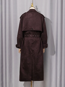 Women's deep purple suede trench coat with adjustable waist belt and storm flap back