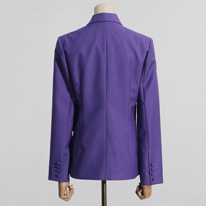 Detail of purple blazer back featuring structured shoulders and decorative cuff buttons