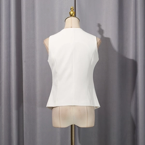 Detailed back view of a white tailored vest made of structured twill suit fabric