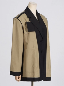 Modern minimalist khaki blazer with black color-block lapels and pockets for women