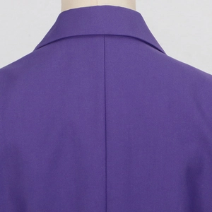 Detail shot of the purple blazer notched lapel and center back seam stitching