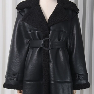 Detail view of black faux leather coat with plush faux fur trim and adjustable waist belt