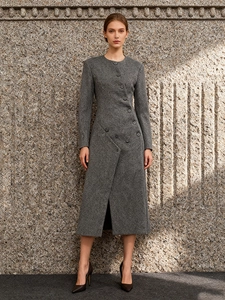 Elegant grey irregular wool coat for women with asymmetrical buttons and long sleeves