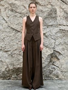Minimalist brown vest and wide-leg trousers set with high-waist draped silhouette