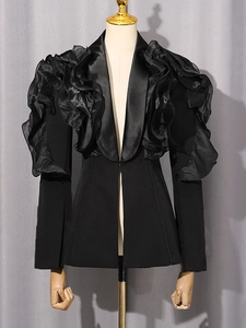 Avant-garde black blazer featuring ruffled organza shoulders and a slim fit waist