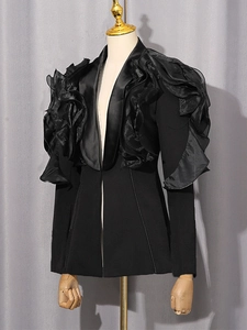 Elegant black fitted blazer featuring dramatic organza ruffles and satin shawl collar