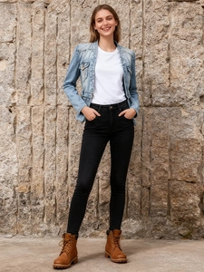 Slim fit light blue denim jacket with chest pockets and casual urban style for women