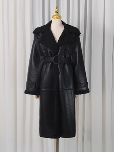 Long black PU leather trench coat with faux fur trim and adjustable waist belt for women
