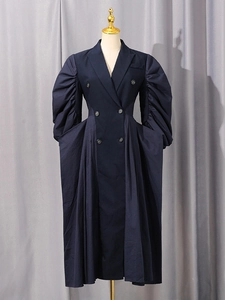 Fashionable navy blue double-breasted trench coat with ruffled puff sleeves and pleated skirt