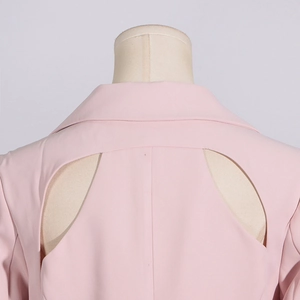 Detail view of pink women suit jacket featuring stylish back hollow-out cutout design