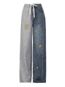Street style high waist patchwork denim pants with grey knit leg and artistic gold patches