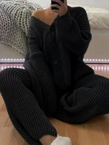 Women's black ribbed knit set with V-neck cardigan and matching trousers for casual wear