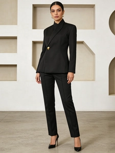 Women's chic black suit set with asymmetric collar blazer and straight trousers