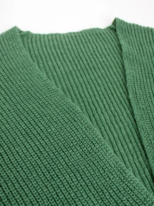 Green knit cardigan for women with ribbed texture and V-neckline in a close-up view