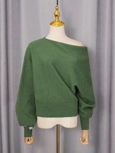Elegant off-the-shoulder dark green knit sweater with puffy lantern sleeves for women