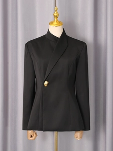 Women's black minimalist suit jacket with asymmetric front design and a single gold button