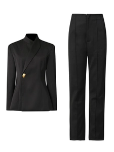 Women's black business suit set with unique asymmetric collar and gold button detail