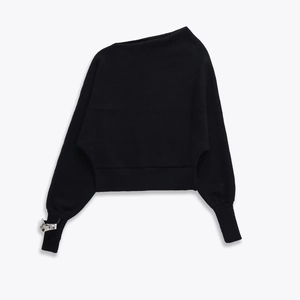 Short black off-shoulder knit sweater with ribbed cuffs and silver metal detail