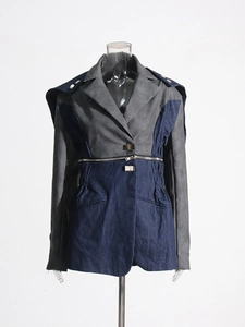 Veste en jean patchwork grise et bleu marine avec fermeture éclair métallique à la taille