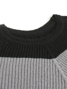 Loose crew neck knit sweater with contrast raglan sleeves and ribbed collar detail