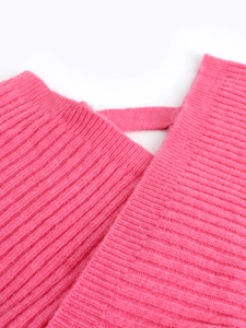 Women's V-neck batwing sleeve knitted sweater in vibrant rose pink ribbed fabric