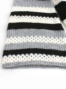 Striped knit pullover with hollow mesh design in black, white, and gray colors